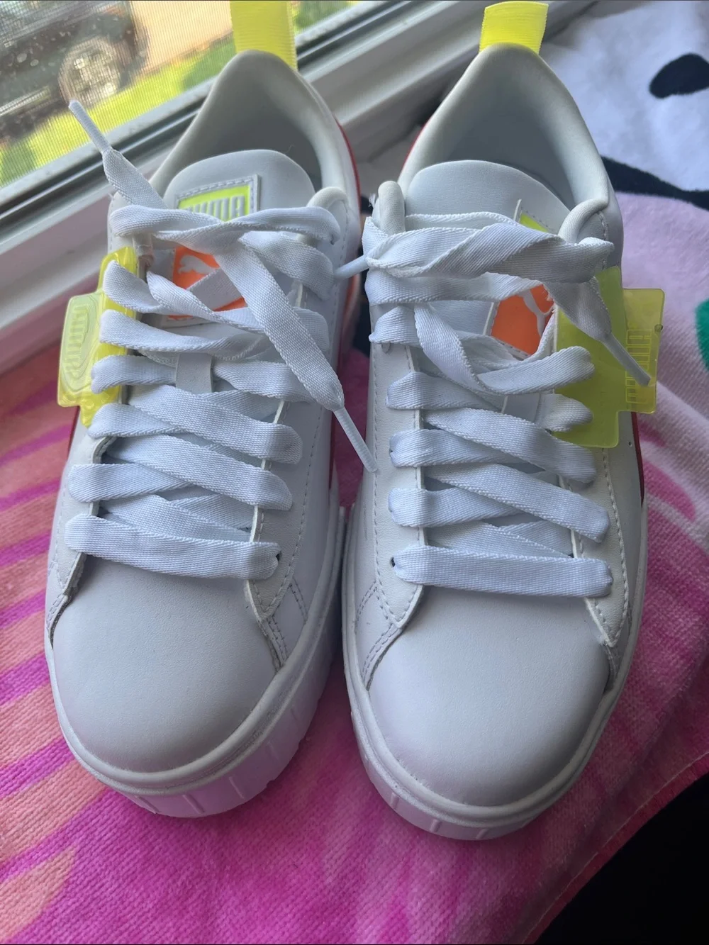 Puma Kids White Sneakers with Neon Yellow and Orange Accents